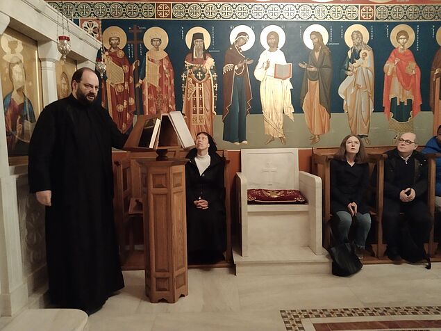 The Greek Orthodox priest monk Athanasius Buk speaks to the students in the Chrysostomos Chapel 